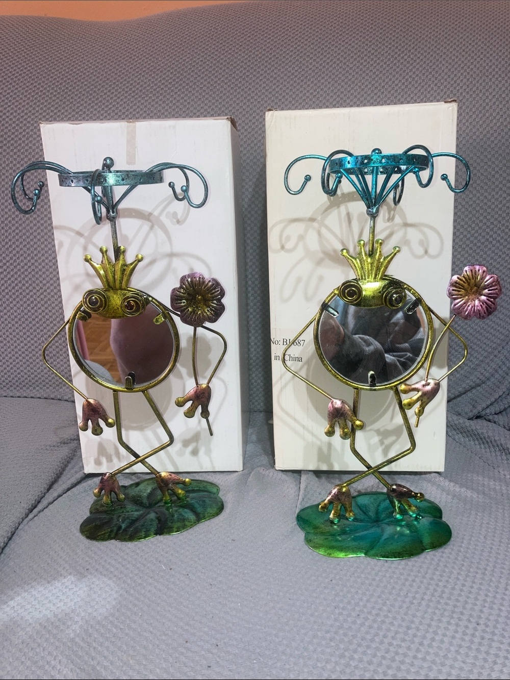 Whimsical Crowned Frog Wall Mirror jewelry display in Gold and Green